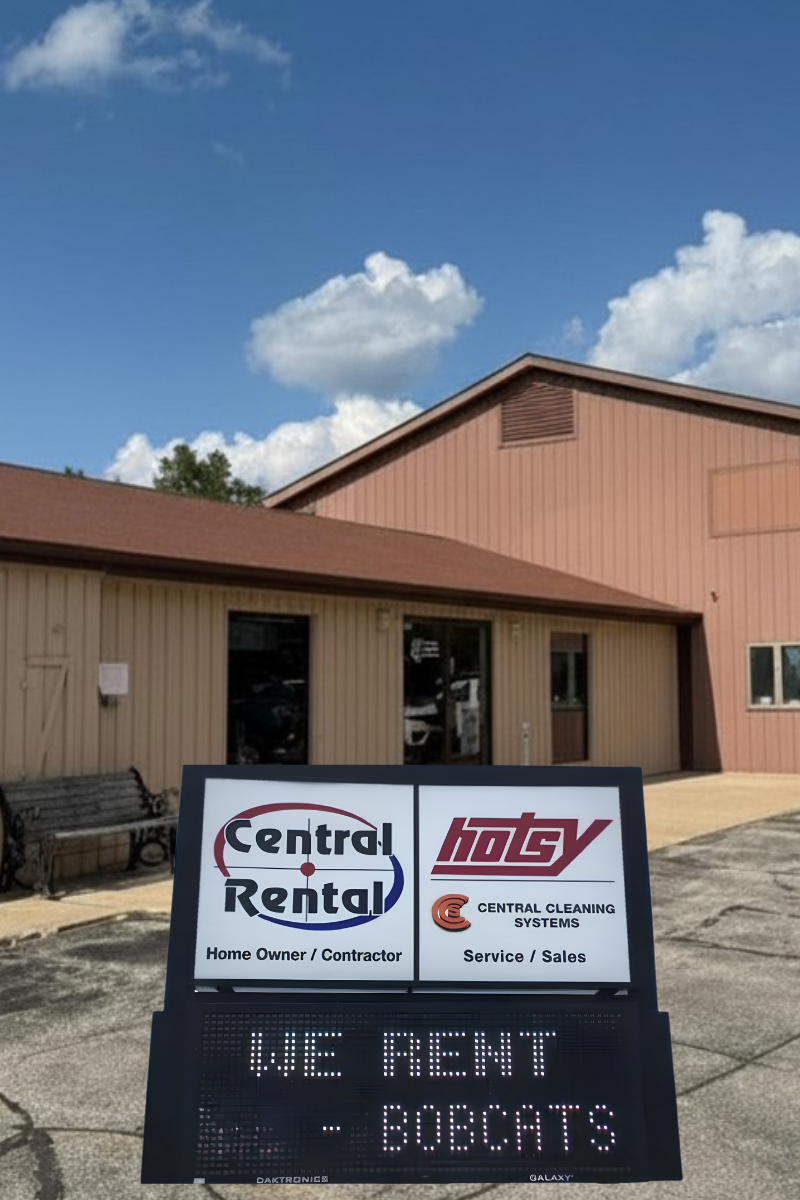 Commercial building with a sign for Central Rental and Hoty, featuring a bench and cloudy sky.