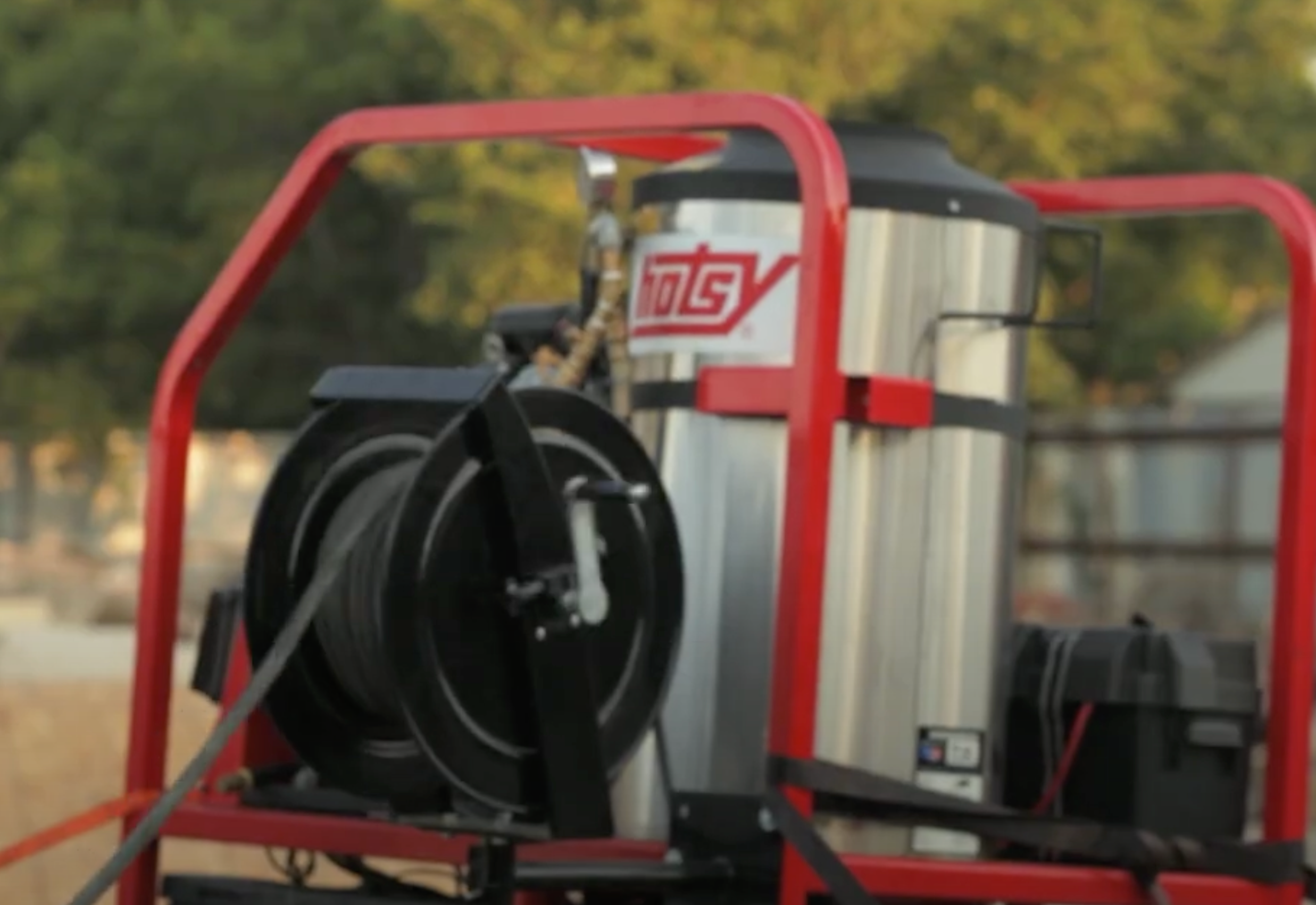 Hotsy hose reel and pressure washer