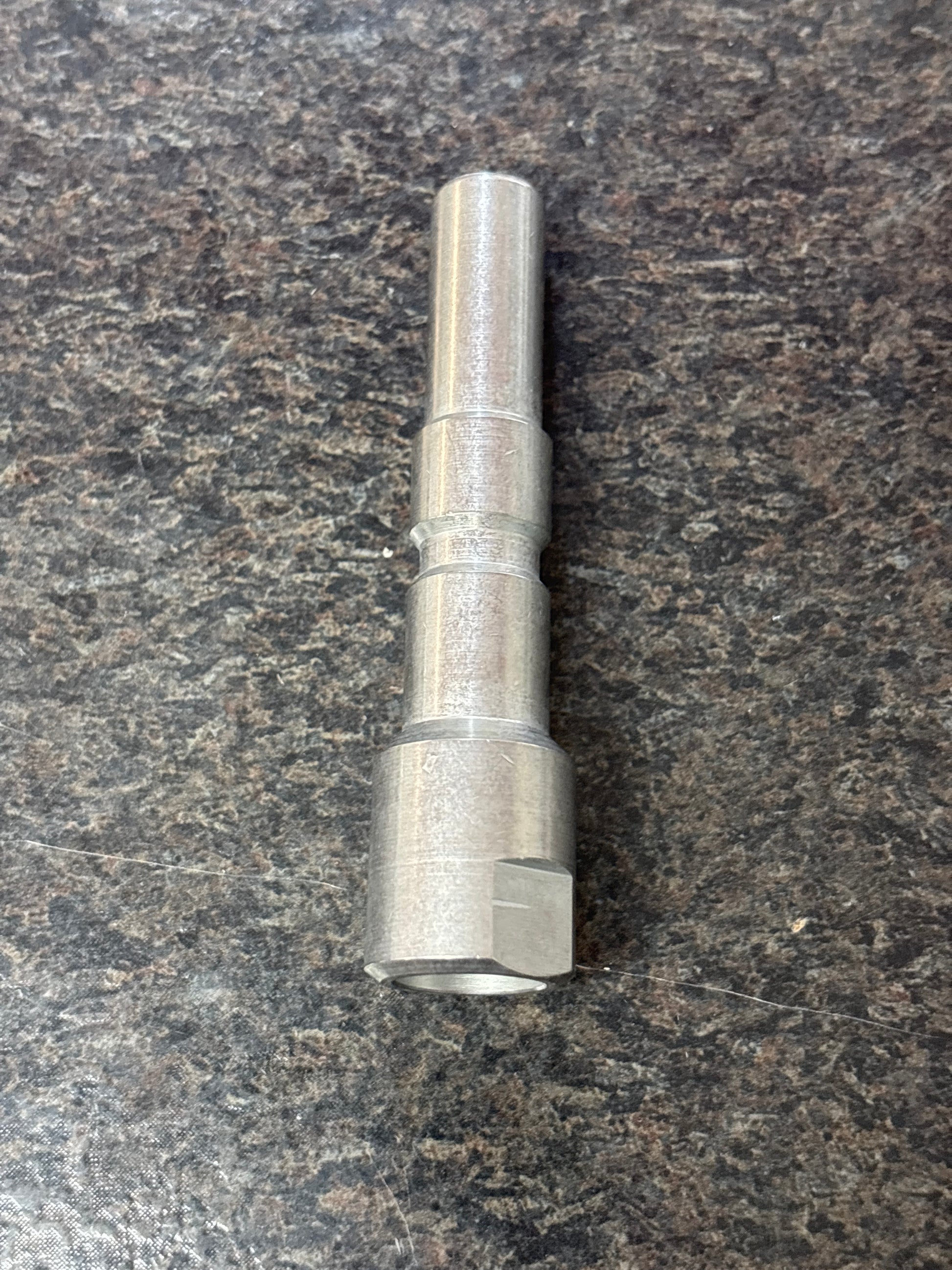 Baren KEW STYLE 1/4 FPT QC SS PLUG resting on counter