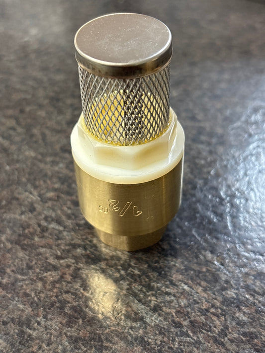 Brass fitting on a dark surface