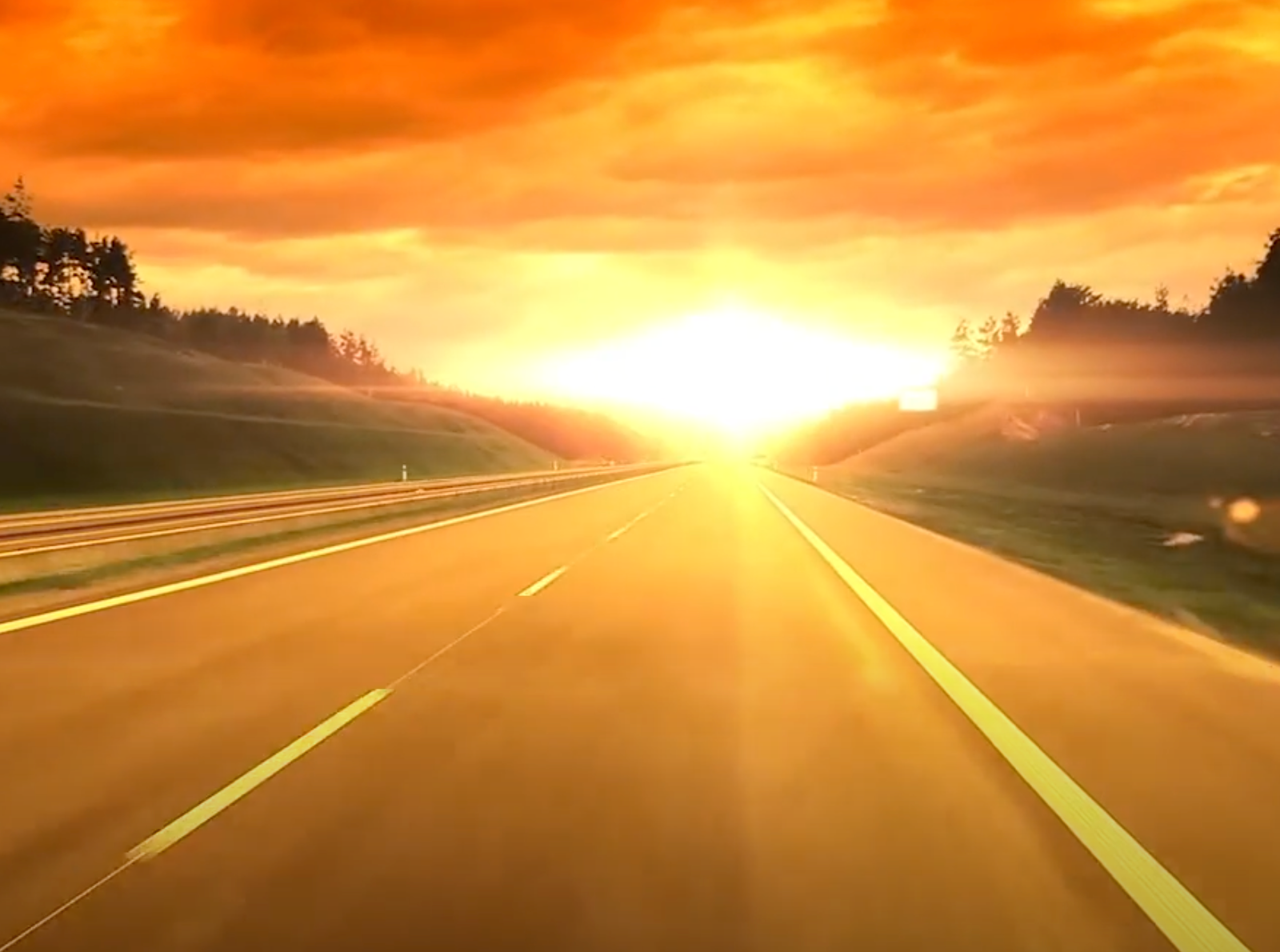 Sunsetting over a long road